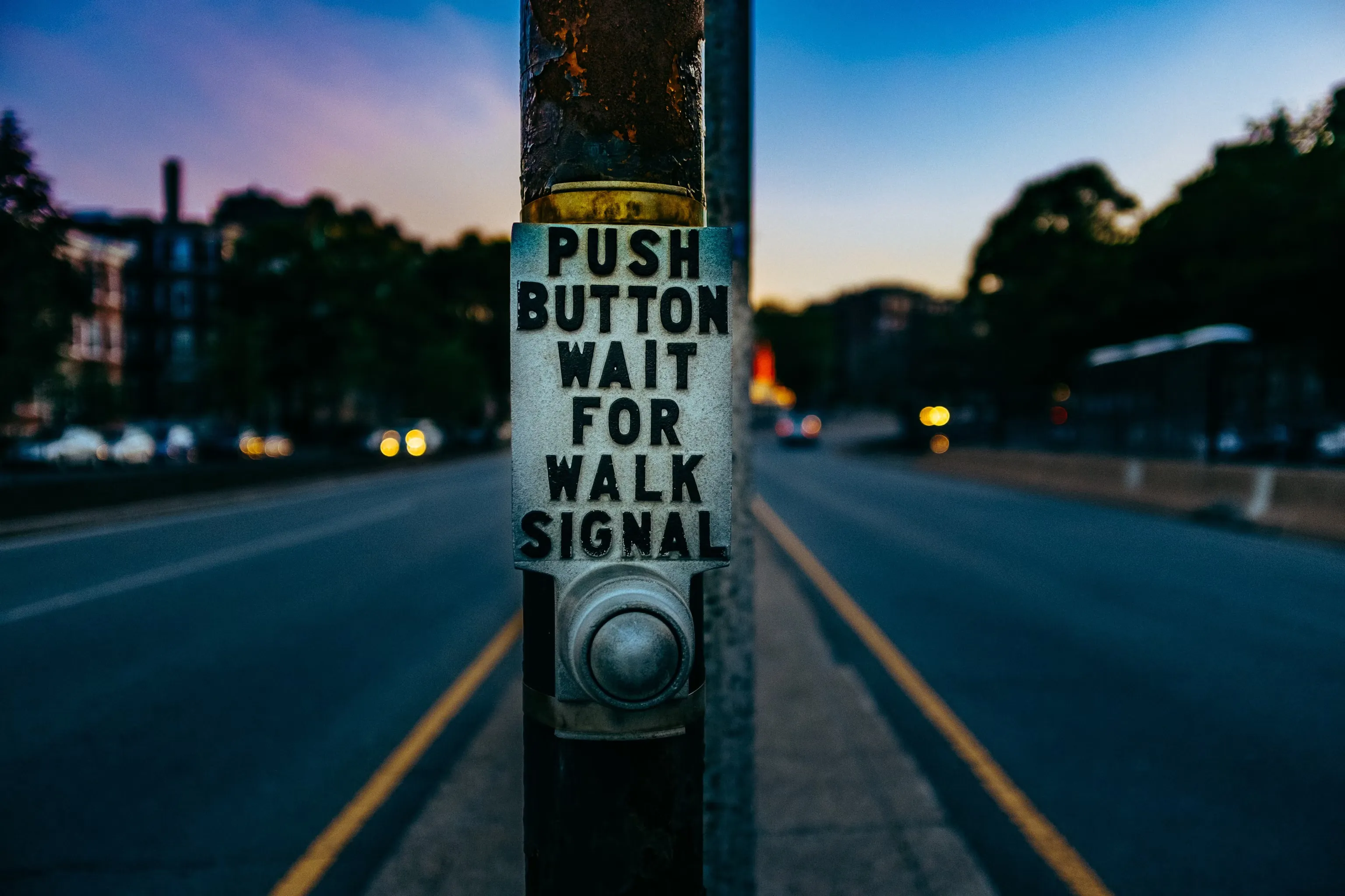 A crosswalk push button to wait for cross signal